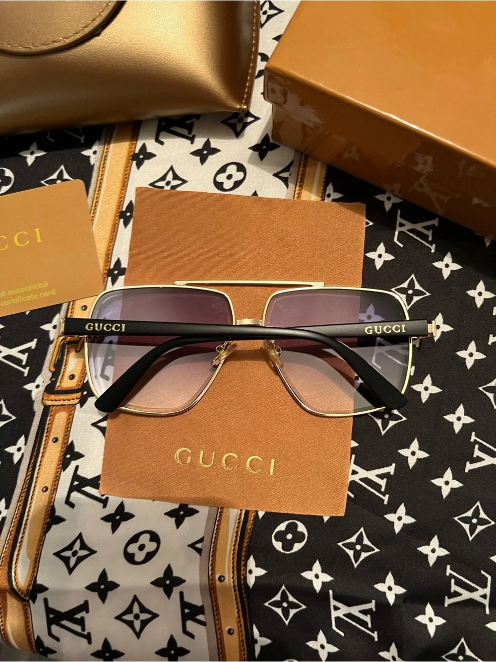 Gucci Gold Frame Sunglasses with Gradient Pink Lenses